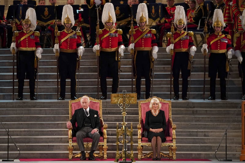 Britain's King Charles III and Queen Consort Camilla sit at Westminster Hall, where both Houses of Parliament are meeting to offer their condolences after the death of Queen Elizabeth II, in London. AP