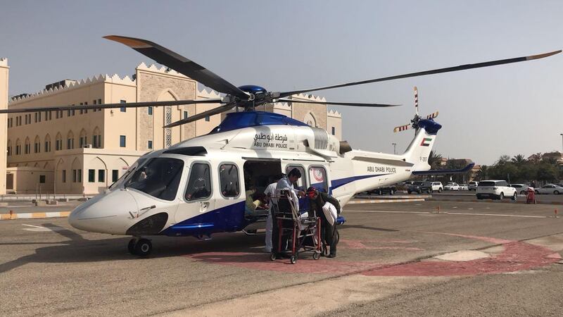 A girl, 10, is delivered to Sheikh Khalifa Medical City after suffering from severe abdominal pain at her home on Dalma Island. Courtesy Abu Dhabi Police