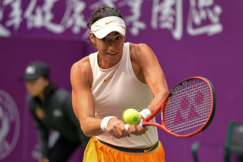 Caroline Garcia of France hits a return against Karolina Pliskova of the Czech Republic in their women's singles final match of the Tianjin Open tennis tournament in north China's Tianjin on October 14, 2018. China OUT
 / AFP / STR
