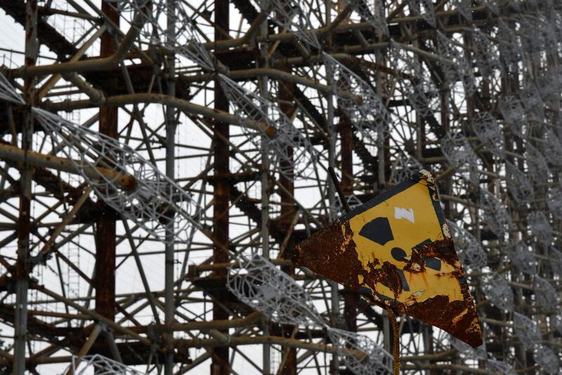 A radiation sign in front of the Soviet-built over-the-horizon radar "Duga-1" near Chernobyl.  AFP