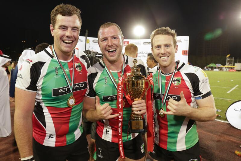 Dubai,UAE, April 7, 2017,  Abu Dhabi Harlequins (red and green) VS. Jebel Ali Dragons (Blue) Premiership final.  (L-R). Conor canny, Ben and Sam Bolger.
Victor Besa for The National
ID: 38294
Reporter:  Paul Radley
Sports *** Local Caption ***  VB_040717_sp-rugby-27.jpg