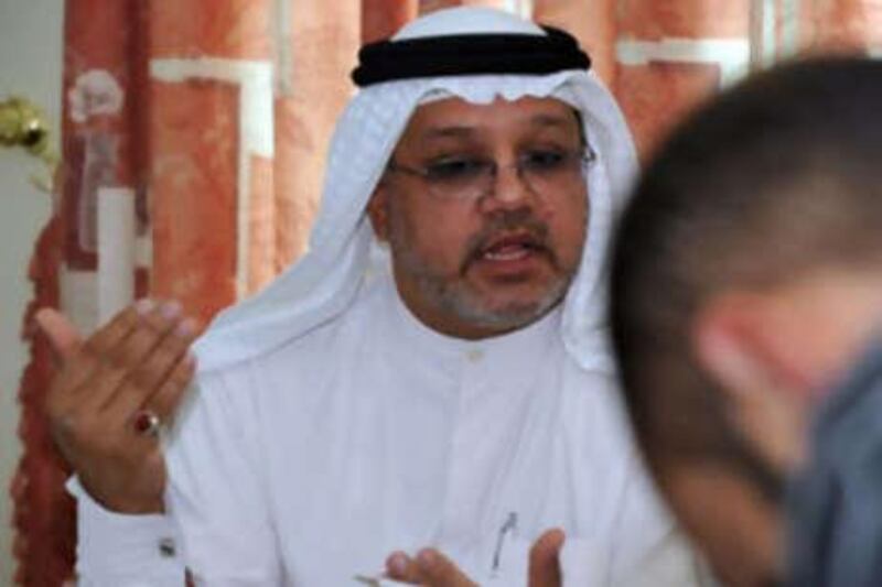 Jalal Fairooz, a member of Bahrain's parliament, speaks to reporters during a press conference yesterday.