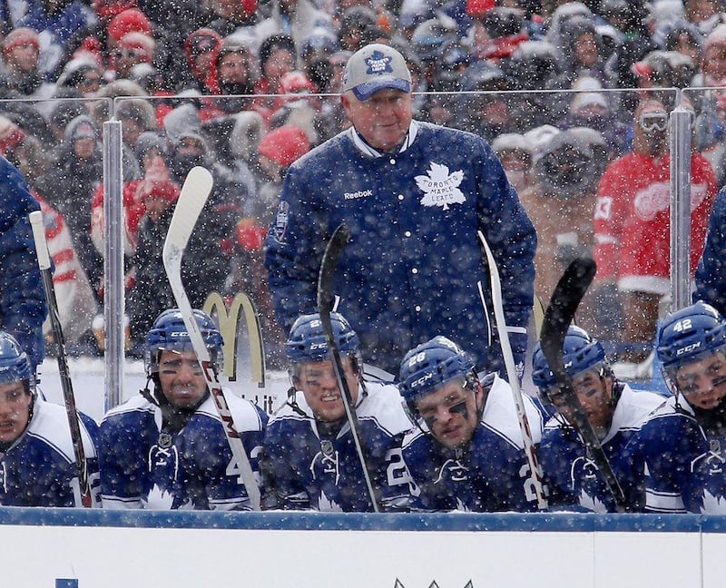 Coach Randy Carlyle of the Toronto Maple Leafs watches the action against the Detroit Red Wings in the first period of the NHL Winter Classic at Michigan Stadium on Wednesday in Ann Arbor, Michigan. Gregory Shamus/Getty Images