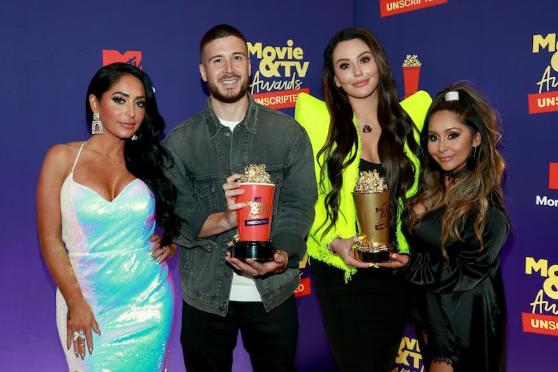 LOS ANGELES, CALIFORNIA - MAY 17: In this image released on May 17, (L-R) Angelina Pivarnick, Vinny Guadagnino, Jenni "JWOWW" Farley, and Nicole "Snooki" Polizzi, winners of the Reality Royalty Award for "Jersey Shore", pose backstage during the 2021 MTV Movie & TV Awards: UNSCRIPTED in Los Angeles, California. (Photo by Matt Winkelmeyer/2021 MTV Movie and TV Awards/Getty Images for MTV/ViacomCBS)
