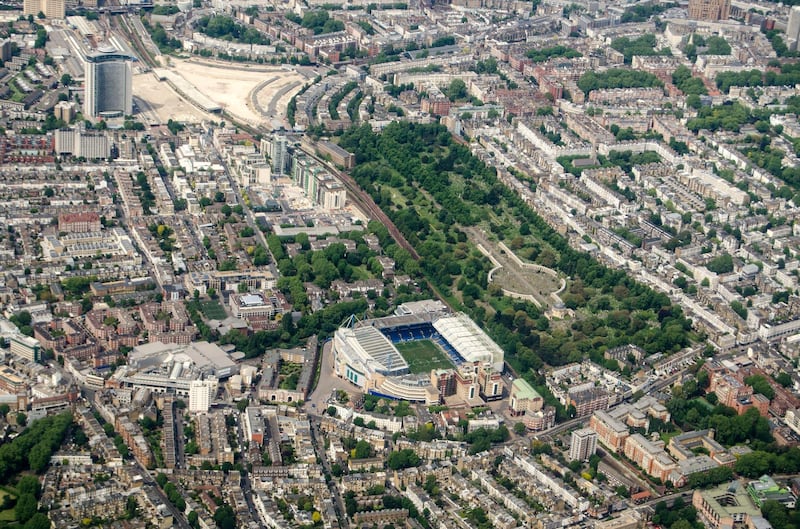 2AK2PEG Aerial view looking north across Chelsea and Earls Court with the Stamford Bridge Stadium - home to Chelsea Football Club and Brompton Cemetary in the