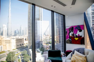 Hage's apartment in Business Bay was selected with his art collection in mind. Leslie Pableo for The National