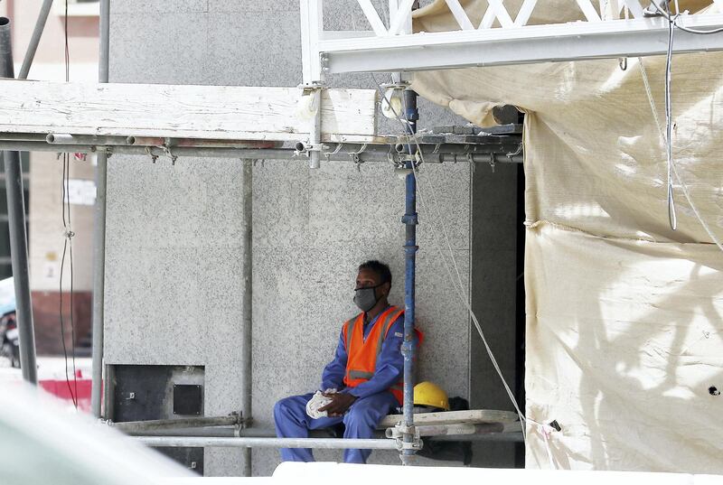 DUBAI, UNITED ARAB EMIRATES , June 15 – 2020 :- Construction worker taking rest during the midday break in Dubai. The UAE’s compulsory midday break for outdoor workers started from June 15. (Pawan Singh / The National) For News. 