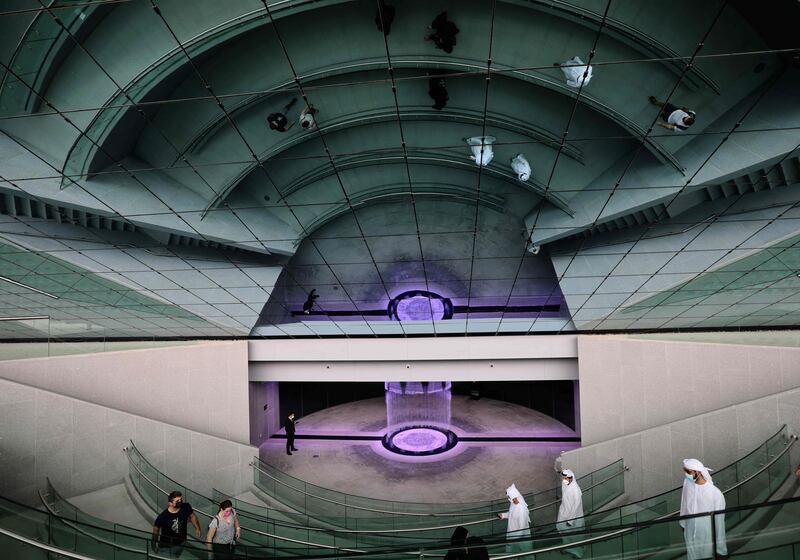 Visitors tour the Saudi Arabia pavilion. AFP