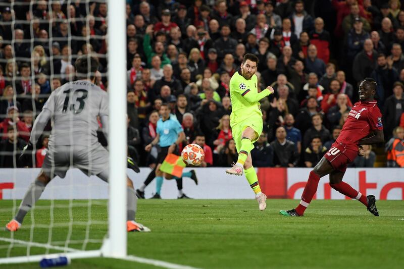 LIVERPOOL, ENGLAND - MAY 07:  Lionel Messi of Barcelona has his shot saved by Alisson of Liverpool during the UEFA Champions League Semi Final second leg match between Liverpool and Barcelona at Anfield on May 07, 2019 in Liverpool, England. (Photo by Shaun Botterill/Getty Images)