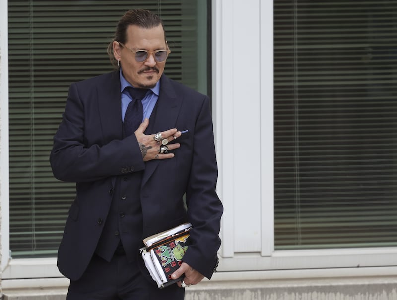 Depp on a break in between closing arguments. Getty Images / AFP
