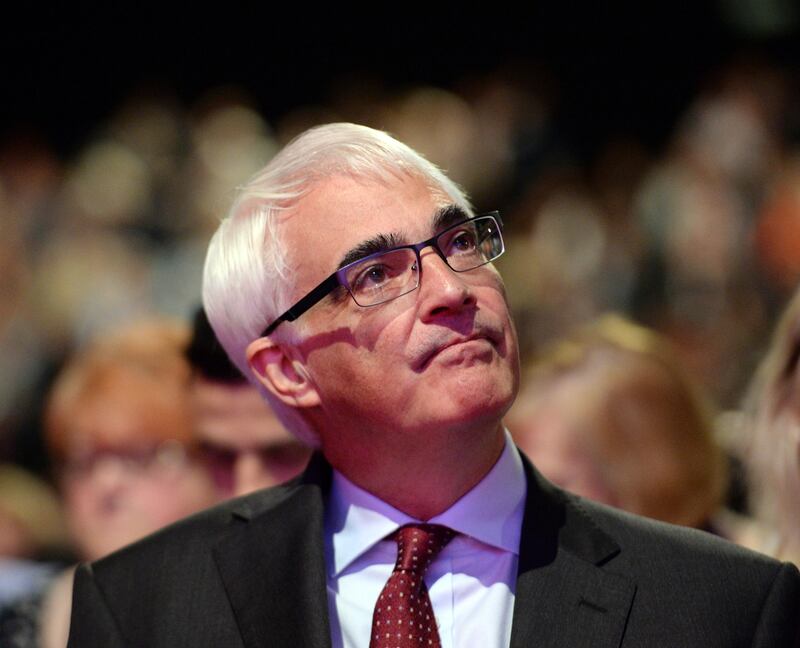 epa04412320 Former Chancellor of the Exchequer in the last Labour government Alistair Darling listens to a speech during the Labour Party's  Annual Conference in Manchester, north west England, 22 September 2014.  EPA/FACUNDO ARRIZABALAGA