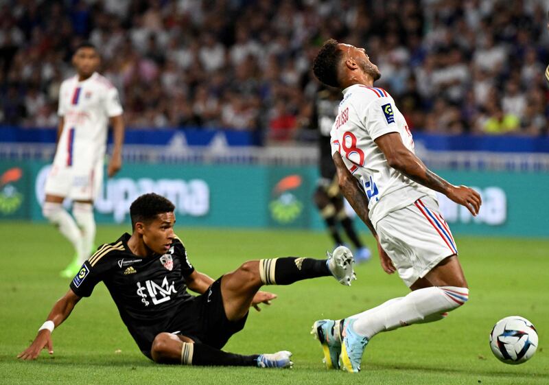 Ajaccio's French midfielder Yanis Cimignani fights for the ball with Lyon's French midfielder Corentin Tolisso. AFP