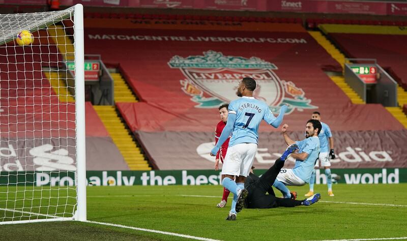 Ilkay Gundogan finishes into the roof of the Liverpool net to put City 1-0 up. Reuters