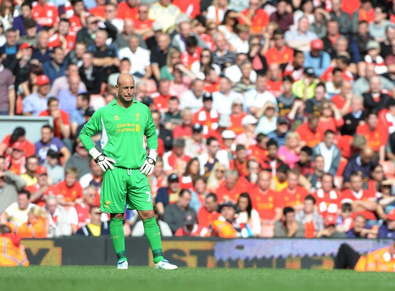 epa03380204 Liverpool's Pepe Reina reacts during the English Premier League soccer match Liverpool vs Arsenal at Anfield in Liverpool, Britain, 02 September 2012.  EPA/PETER POWELL DataCo terms and conditions apply.  http//www.epa.eu/downloads/DataCo-TCs.pdf *** Local Caption ***  03380204.jpg