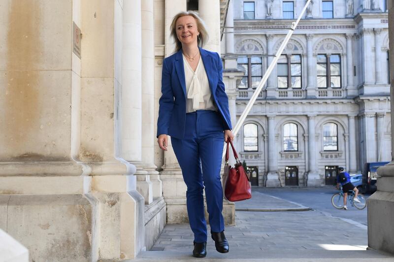 FILE PHOTO: Britain's International Trade Secretary Liz Truss arrives at the Foreign and Commonwealth Office (FCO), ahead of a cabinet meeting to be held at the FCO, for the first time since the COVID-19 lockdown in London, Britain July 21, 2020. Stefan Rousseau/Pool via REUTERS/File Photo