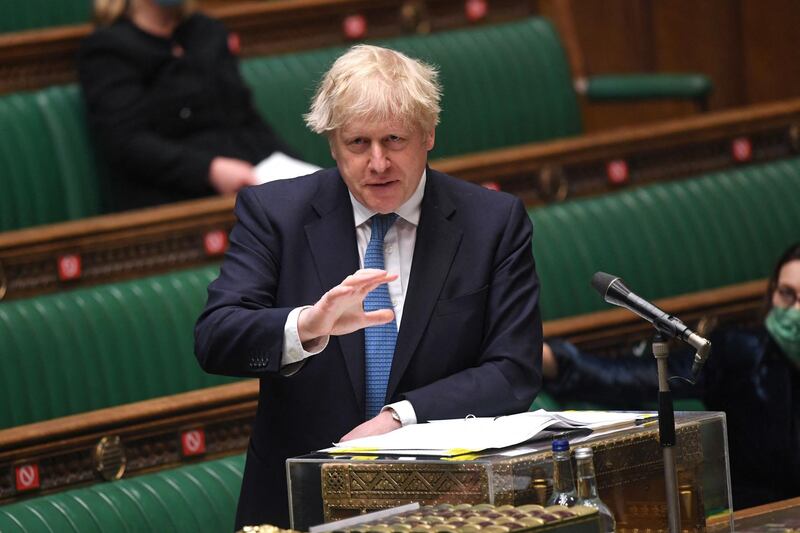 A handout photograph released by the UK Parliament shows Britain's Prime Minister Boris Johnson updating MPs on the Covid-19 pandemic in a socially distanced, hybrid session at the House of Commons, in central London on May 12, 2021.  An independent public inquiry into the British government's handling of the coronavirus pandemic will be held early next year, Prime Minister Boris Johnson said on Wednesday. The country had "found itself in the teeth of the gravest pandemic for a century" and the state has "an obligation to examine its actions as rigorously and as candidly as possible and to learn every lesson for the future", he told lawmakers. - RESTRICTED TO EDITORIAL USE - NO USE FOR ENTERTAINMENT, SATIRICAL, ADVERTISING PURPOSES - MANDATORY CREDIT " AFP PHOTO / Jessica Taylor /UK Parliament"
 / AFP / UK PARLIAMENT / JESSICA TAYLOR / RESTRICTED TO EDITORIAL USE - NO USE FOR ENTERTAINMENT, SATIRICAL, ADVERTISING PURPOSES - MANDATORY CREDIT " AFP PHOTO / Jessica Taylor /UK Parliament"
