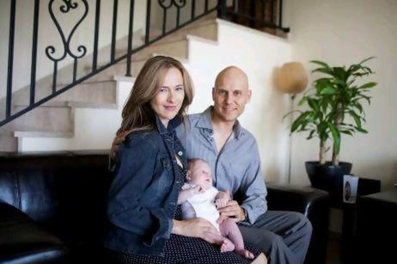 Angelique and Daryl Arbuckle with their son Ashton at their Arabian Ranches home in Dubai.