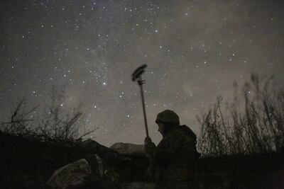 Ukrainian serviceman check the situation on a front line near Svetlodarsk, not far from the pro-Russian militant-controlled city of Horlivka. EPA