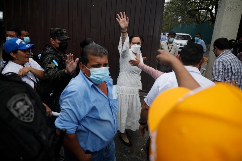 Former Honduran first lady and wife of former president Juan Orlando Hernandez, Ana Garcia, waves to supporters en route to the Supreme Court building in Tegucigalpa, Honduras. AP