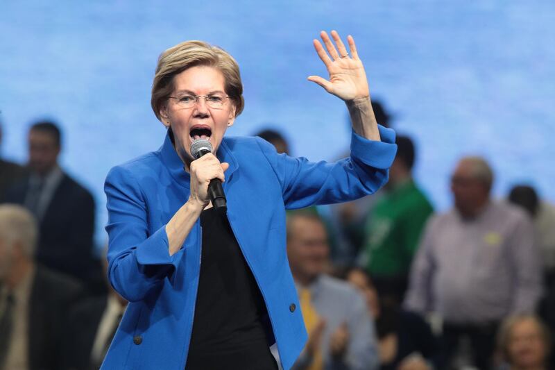 Democratic presidential candidate Sen. Elizabeth Warren (D-MA) speaks at the Liberty and Justice Celebration at the Wells Fargo Arena on  in Des Moines, Iowa. Fourteen of the candidates hoping to win the Democratic nomination for president are expected to speak at the Celebration.  AFP