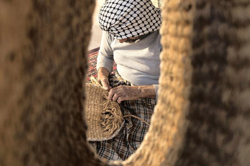 Mohammed, Saudi Arabia: This photo was taken in the eastern Saudi town of Al Awamiah, where Mohammed takes a trip to the local souq to meet a man crafting saddles out of palm strings before displaying it to the local market’s visitors.