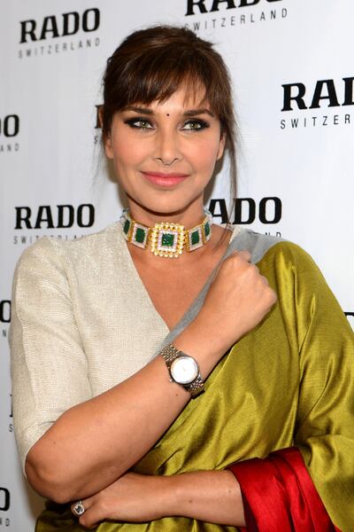 Bollywood actress Lisa Ray poses during the launch of new collection of Rado watches at the new standard time store in Amritsar on October 10, 2019. (Photo by NARINDER NANU / AFP)