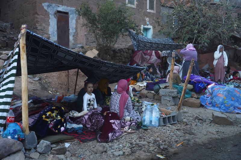 People camp on the roadside after the deadly earthquake in Imgdal, Morocco. Reuters