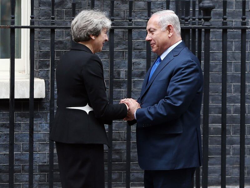 epa06303609 Britain's Prime Minister Theresa May (L) greets Israeli Prime Minister Benjamin Netanyahu (R) at Downing Street 10 in London , Britain, 02 November 2017. The two leaders met for a bilateral meeting and to mark 100th anniversary of the Balfour declaration.  EPA/NEIL HALL