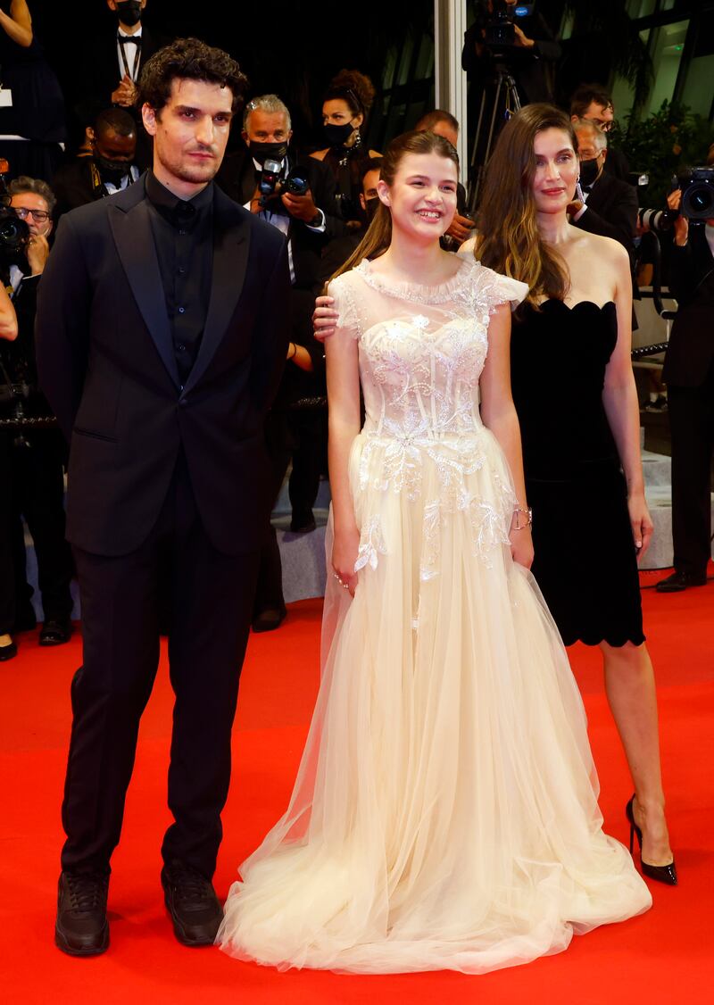 Louis Garrel, Julia Boeme and Laetitia Casta attend a screening of 'Bac Nord' at the 74th annual Cannes Film Festival on July 12, 2021