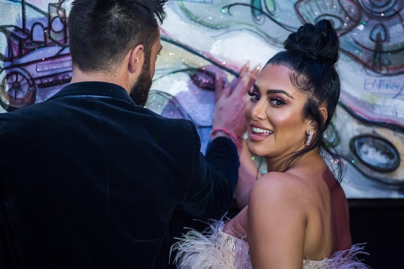 Iraqi-American beauty entrepreneur Huda Kattan pictured with British artist Sacha Jafri. Huda is one of the most successful self-made businesswomen in the Middle East today and is estimated by Forbes to be worth more than $500 million. She has lived in Dubai since 2008. Courtesy: Sacha Jafri