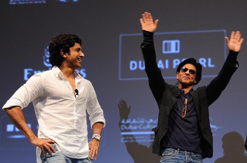 The actor and director Farhan Akhtar, left,  and the actor Shah Rukh Khan, who have announced their new film together. Andrew H Walker / Getty Images