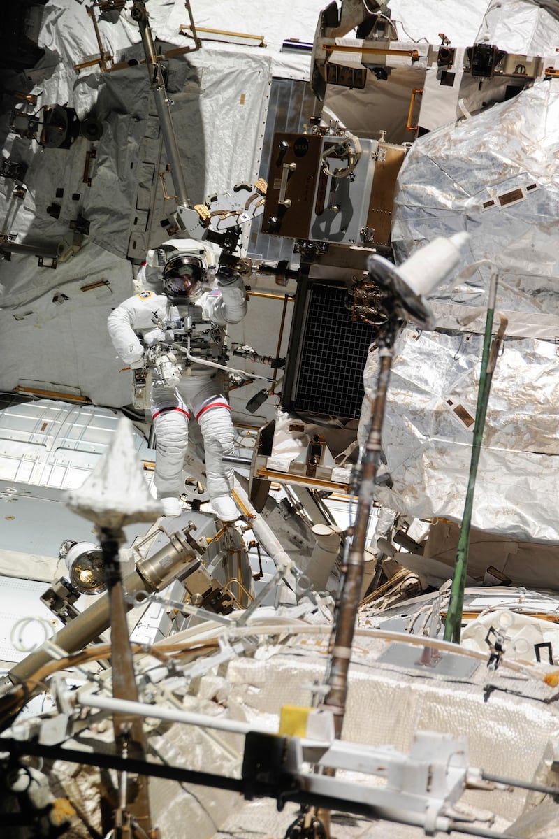 Extravehicular Mobility Unit - ISS036-E-020926 (16 July 2013) --- NASA astronaut Chris Cassidy, Expedition 36 flight engineer, attired in an Extravehicular Mobility Unit (EMU) spacesuit, participates in a session of extravehicular activity (EVA) as work continues on the International Space Station. A little more than one hour into the spacewalk, European Space Agency astronaut Luca Parmitano (out of frame) reported water floating behind his head inside his helmet. The water was not an immediate health hazard for Parmitano, but Mission Control decided to end the spacewalk early. Courtesy Nasa