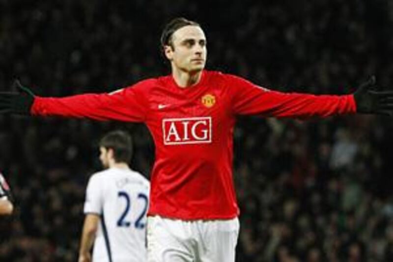 The Manchester United striker Dimitar Berbatov scored the winning goal against his old club Tottenham to book the Red Devils's place in the fifth round of the FA Cup.