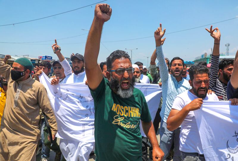 Kashmiri Muslims shout slogans during a protest march in Srinagar. EPA