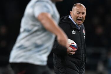 England's coach Eddie Jones watches his players warm up ahead of the Autumn International friendly rugby union match between England and Australia at Twickenham Stadium, west London, on November 13, 2021.  (Photo by Glyn KIRK  /  AFP)