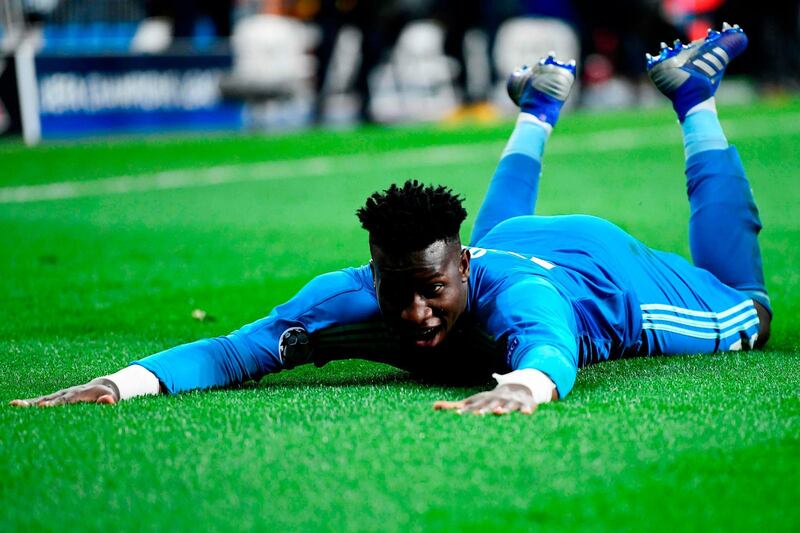 Ajax's Cameroonian goalkeeper Andre Onana celebrates. AFP