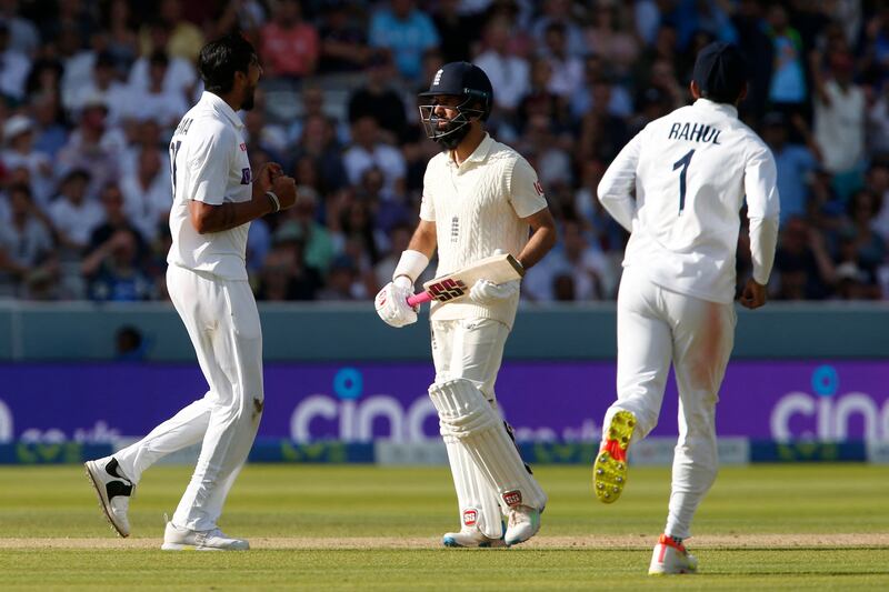 India's Ishant Sharma celebrates taking the wicket of England's Moeen Ali.
