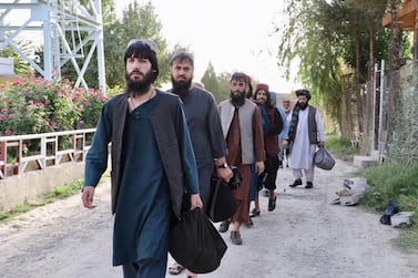 Taliban prisoners preparing to leave a government prison in Kabul, Afghanistan, as part of an arrangement to persuade the insurgent group to start peace talks. EPA