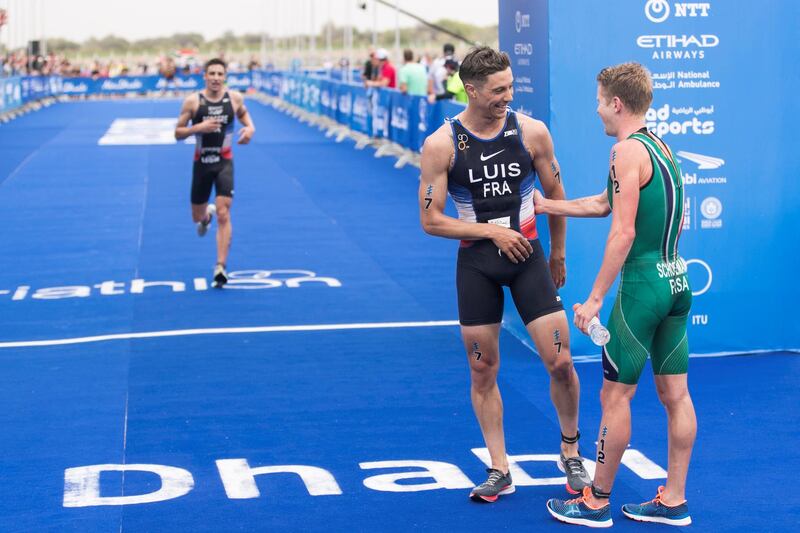 ABU DHABI, UNITED ARAB EMIRATES - MARCH 03, 2018.

Henri SCHOEMAN from Russia, right, who won first place, shakes hands with third place winner  Vincent Mola, France, who won third place at the Elite Men Abu Dhabi Triathlon.

(Photo: Reem Mohammed/ The National)

Reporter: AMITH PASSATH
Section: SP
