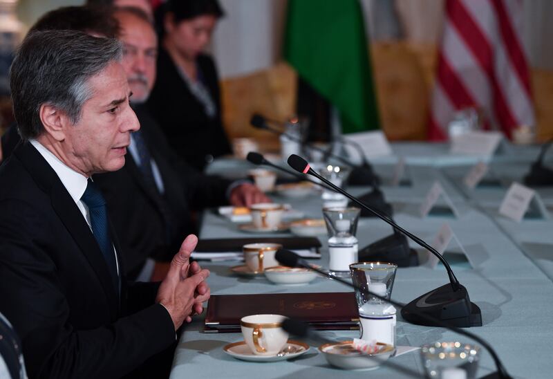 Secretary of State Antony Blinken, left, speaks during a meeting with Jordanian King Abdullah II at the State Department in Washington.