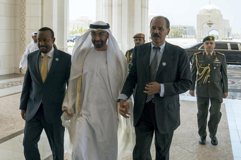ABU DHABI, UNITED ARAB EMIRATES - July 24, 2018: HH Sheikh Mohamed bin Zayed Al Nahyan Crown Prince of Abu Dhabi Deputy Supreme Commander of the UAE Armed Forces (C), receives HE Dr Abiy Ahmed, Prime Minister of Ethiopia (L) and HE Isaias Afwerki, President of Eritrea (R), at the Presidential Palace. 

( Hamad Al Kaabi / Crown Prince Court - Abu Dhabi )
---
