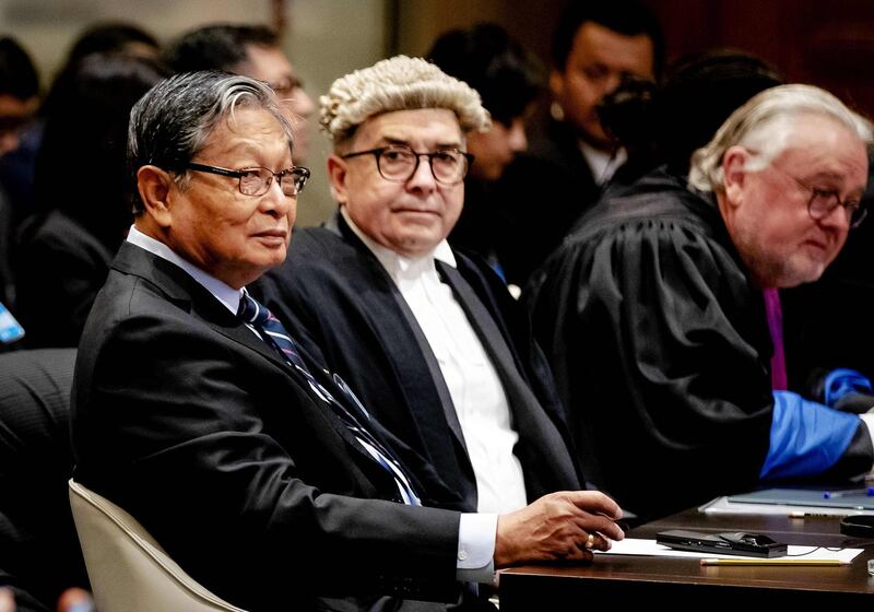 Kyaw Tint Swe, Union Minister of Myanmar (L) looks on during the ruling of the International Court of Justice in The Hague, on January 23, 2020 in the lawsuit filed by The Gambia against Myanmar in which Myanmar is accused of genocide against Rohingya Muslims. The UN's top court ordered Myanmar on January 23 to take "all measures within its power" to prevent alleged genocide against Rohingya Muslims. The International Court of Justice granted a series of emergency steps requested by the mainly Muslim African state of The Gambia under the 1948 Genocide Convention.
 - Netherlands OUT
 / AFP / ANP / Robin VAN LONKHUIJSEN
