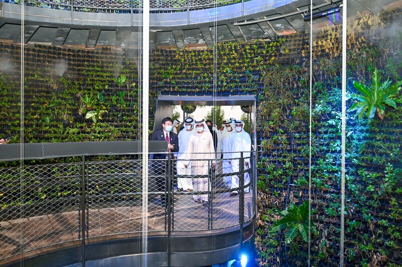 Sheikh Mohammed tours the Singapore pavilion, which aims to reflect 'a city in nature'.