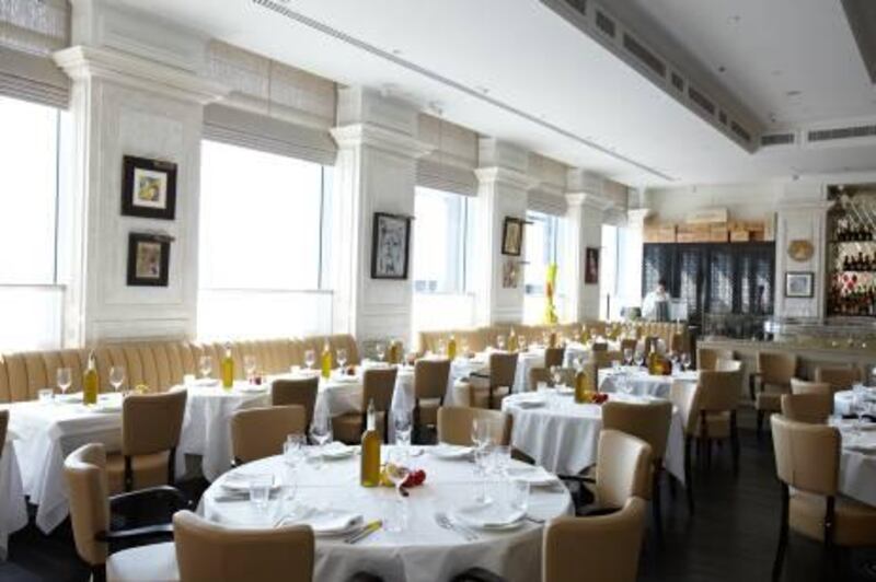 La Petite Maison has the touchstones of a traditional French brasserie, with colourful modern art and white tablecloths but with plenty of light.