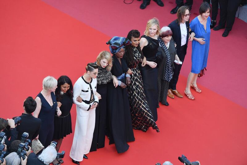 CANNES, FRANCE - MAY 12:  (2nd L-R) Haifaa al-Mansour, Kirsten Stewart, Lea Seydoux,  Khadja Nin, Ava DuVernay, Cate Blanchett and Agnes Varda walk the red carpet in protest of the lack of female filmmakers honored throughout the history of the festival at the screening of "Girls Of The Sun (Les Filles Du Soleil)" during the 71st annual Cannes Film Festival at the Palais des Festivals on May 12, 2018 in Cannes, France. Only 82 films in competition in the official selection have been directed by women since the inception of the Cannes Film Festival whereas 1,645 films in the past 71 years have been directed by men.  (Photo by Emma McIntyre/Getty Images)