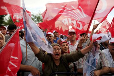 Supporters of Muharrem Ince, presidential candidate of the main opposition Republican People's Party (CHP), wave Turkish and party flags during an election rally in Diyarbakir, Turkey June 11, 2018. REUTERS/Sertac Kayar