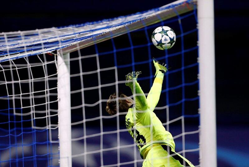 Dinamo Zagreb’s goalkeeper Adrian Semper jumps for the ball. Antonio Bronic / Reuters