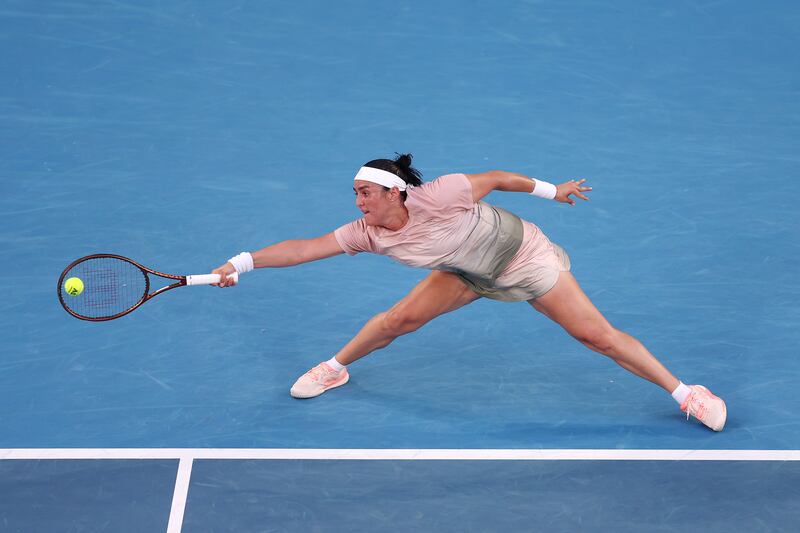 Ons Jabeur stretches for the ball during her match against Yuliia Starodubtseva. Getty Images