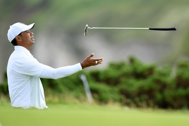 PORTRUSH, NORTHERN IRELAND - JULY 19: Tiger Woods of the United States tosses his club during the second round of the 148th Open Championship held on the Dunluce Links at Royal Portrush Golf Club on July 19, 2019 in Portrush, United Kingdom. (Photo by Stuart Franklin/Getty Images)