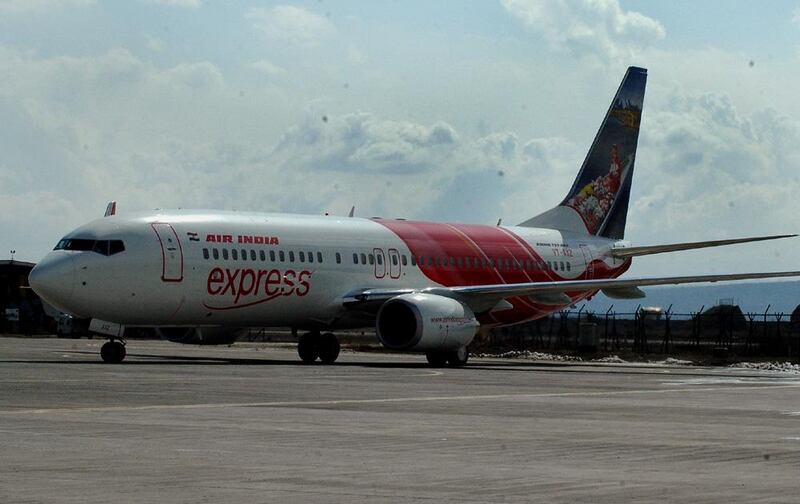 February 14, 2009: 6. The first Air India Express flight arrived at the Srinagar International Airport on Saturday, 14 February 2009. The new aircraft inducted in its  fleet has a flower-laden 'Shikara' (gondola) on Srinagar's pristine glory, the Dal Lake  on one side of the tail and an 'image of a large expanse of the Rajasthan Desert' on the other side. The tail designs are an innovative and novel feature of the Air Indian Express fleet. Each of the aircraft showcases the picturesque landscapes, monuments, birds, animals, handicraft and dances of India on both sides of the tail.


Habibullah Naqash for The National
